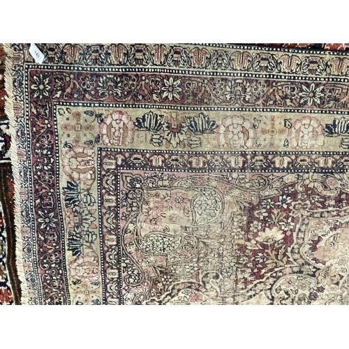 143 - Carpets & Rugs: 19th cent. Persian rug, red ground with stylised floral decoration, four borders all... 