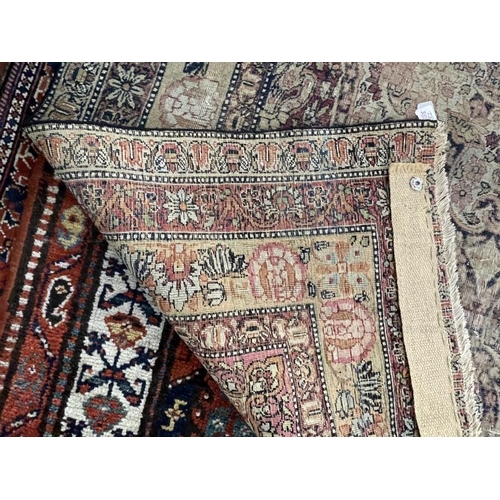 143 - Carpets & Rugs: 19th cent. Persian rug, red ground with stylised floral decoration, four borders all... 