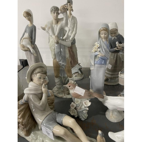 197 - Porcelain: 20th cent. Lladro figures girl with a lamb 11ins, boy with goat 11ins, boy seated with bi... 