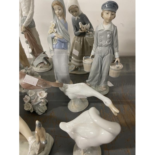 197 - Porcelain: 20th cent. Lladro figures girl with a lamb 11ins, boy with goat 11ins, boy seated with bi... 