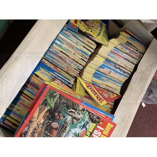 334 - Children's Books: Large quantity of 1970s/80s annuals, comics and books to include Beano, Dandy, Bus... 