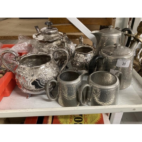 35 - Early 20th cent. White metal embossed three piece tea set plus Civic Pewter four piece tea set.