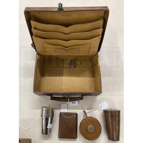 372 - Luggage & Travel: Small leather travelling case 1920s/30s with embossed I.M.G. to the top, fitted in... 