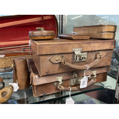 372 - Luggage & Travel: Small leather travelling case 1920s/30s with embossed I.M.G. to the top, fitted in... 