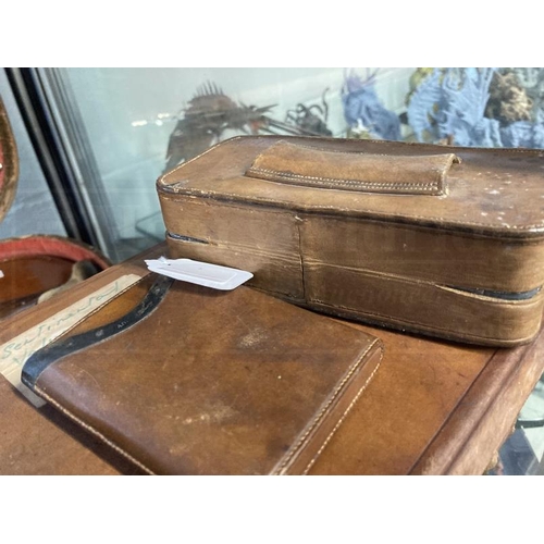 372 - Luggage & Travel: Small leather travelling case 1920s/30s with embossed I.M.G. to the top, fitted in... 