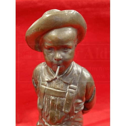 385A - C. Kundonmann: Bronze figure of a boy smoking a Cheroot raised on a black marble base, signed C. Kun... 