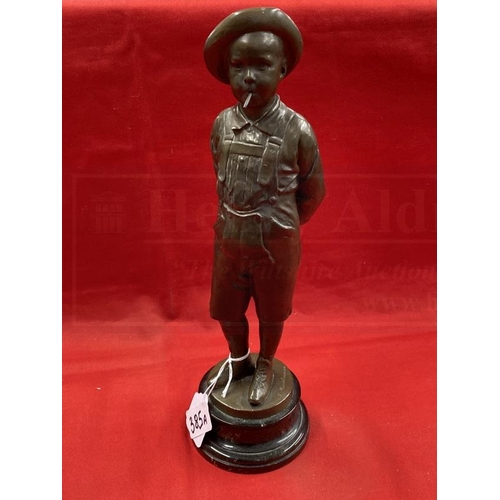 385A - C. Kundonmann: Bronze figure of a boy smoking a Cheroot raised on a black marble base, signed C. Kun... 