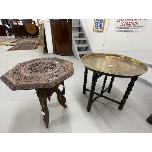 40 - Indian carved table with octagonal top carved with border of flowers, central panel of warrior astri... 