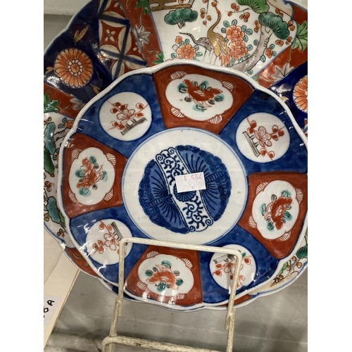 405 - Ceramics/Asian: Mixed lot to include a pair of Imari chargers 11¾ins, another Imari charger, plate, ... 