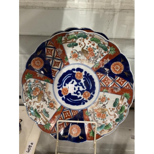 405 - Ceramics/Asian: Mixed lot to include a pair of Imari chargers 11¾ins, another Imari charger, plate, ... 