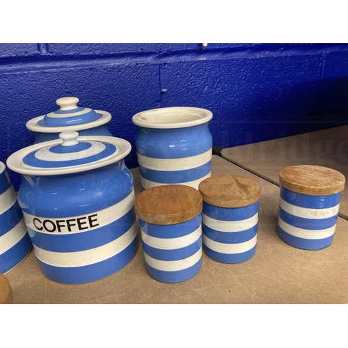 414 - Ceramics: Banded T.G. Green and style mostly modern blue banded canisters and kitchen ware. (13)