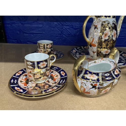 432 - Royal Crown Derby tea ware Imari pattern 2451, fifty-five pieces to include tea set, coffee set side... 