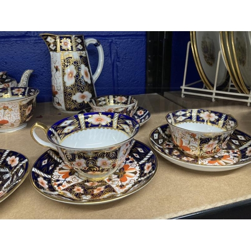 432 - Royal Crown Derby tea ware Imari pattern 2451, fifty-five pieces to include tea set, coffee set side... 