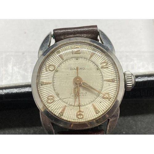 495 - Watches: Baume ladies stainless steel cased watch with leather strap. No. 6029/1.