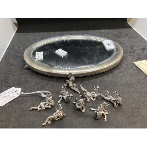 540 - Hallmarked Silver: Oval mirror 9½ins. x 6½ins. Plus eight place name holders in the form of cherubs.... 