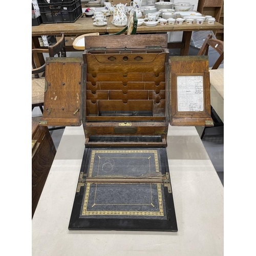 69 - 19th cent. Victorian oak military stationery box, two oak doors with brass bands opening to reveal a... 