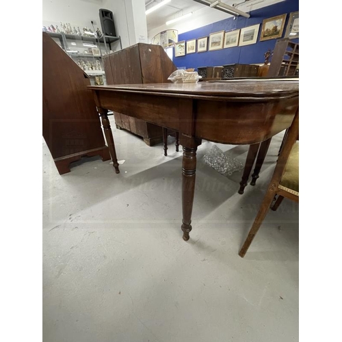 85 - Regency mahogany D shaped dining tables on ring turned tapering legs, a pair. 29½ins. x 57ins. x 54i... 