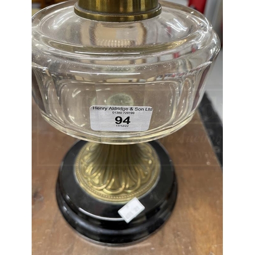 94 - Oil lamp, Sharwoods Ltd etched shade, cut glass reservoir, brass column on a black ceramic base.