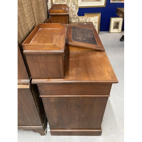 103 - 19th cent. Mahogany desk with integral reading slope with leather skiver, two four drawer pedestal e... 