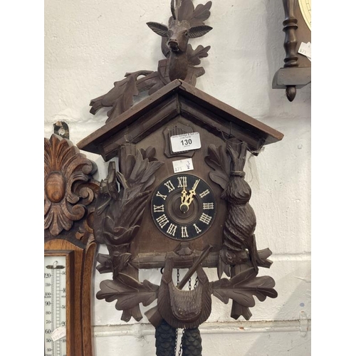 130 - Clocks: Group of three to include 20th cent. German oak cased mantel clock surmounted by turned fini... 