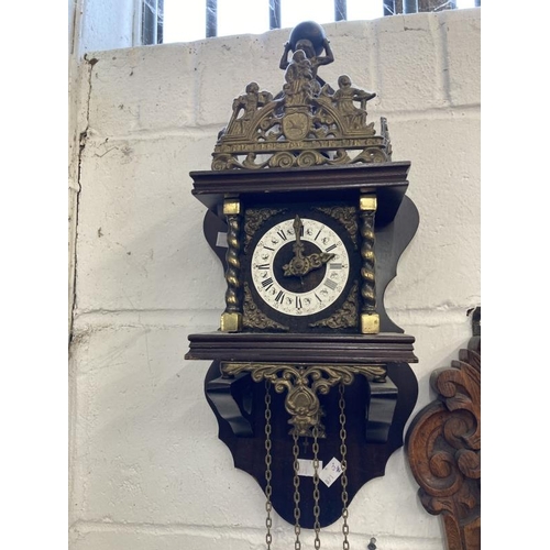 130 - Clocks: Group of three to include 20th cent. German oak cased mantel clock surmounted by turned fini... 