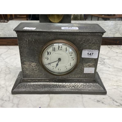 147 - Clocks: Liberty & Co planished pewter mantel clock, impressed base English Pewter Made by Liberty & ... 