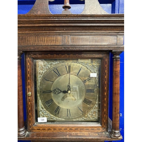 149 - Clocks: Late 18th cent. Oak cased long case clock, pediment top inlaid case on bracket feet, brass s... 