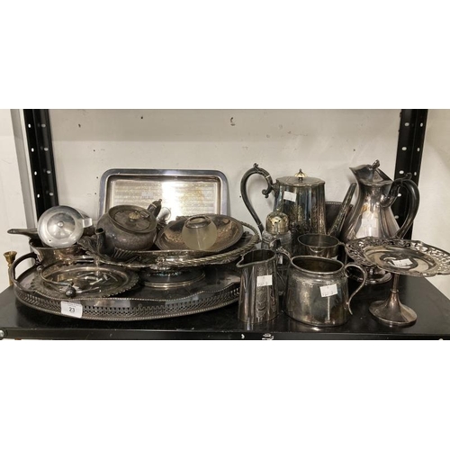 23 - Silver Plate: A collection to include pair of hallmarked silver candlesticks, hip flask, jug, fish e... 