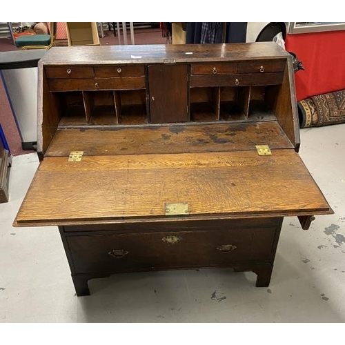 63 - Late 19th/early 20th cent. Mahogany bureau with bracket supports and felted interior.