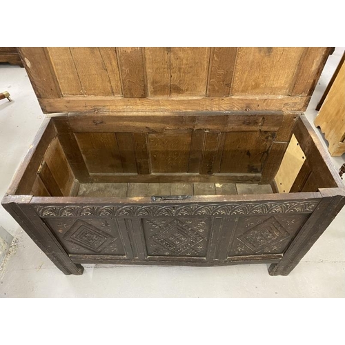 68 - Early 18th cent. Carved oak coffer with hinged rectangular lid, three panel front with diamond shape... 