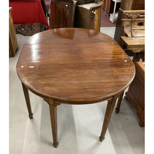 77 - Edwardian demi-lune mahogany dining table, moulded edge on square tapered legs & spade feet with one... 