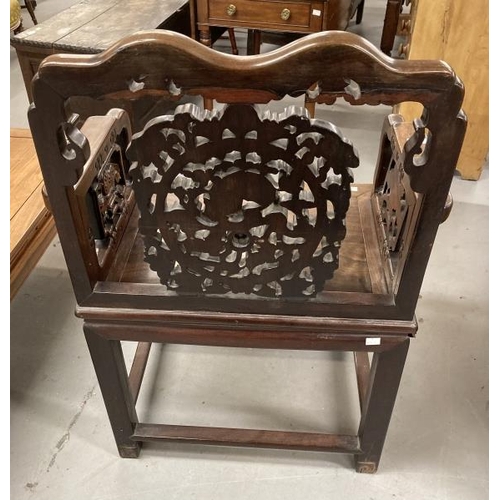 86 - 19th cent. Chinese hardwood armchair, the back with shaped top rail, central carved panel of lion do... 