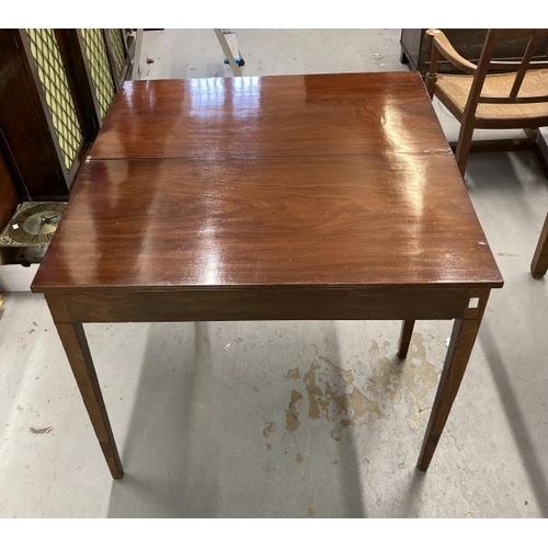 89 - 19th cent. Mahogany tea table, the rectangular top with reeded edge on squared tapered legs. 34ins. ... 