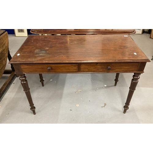 97 - 19th cent. Mahogany two drawer side table, the top with a moulded edge, the drawers with wooden knob... 