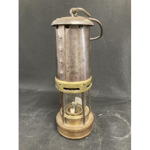 179 - Miners Safety Lamps: Early 20th cent. Evan Thomas & Williams, Aberdare No. B136, clock No. 655, cons... 