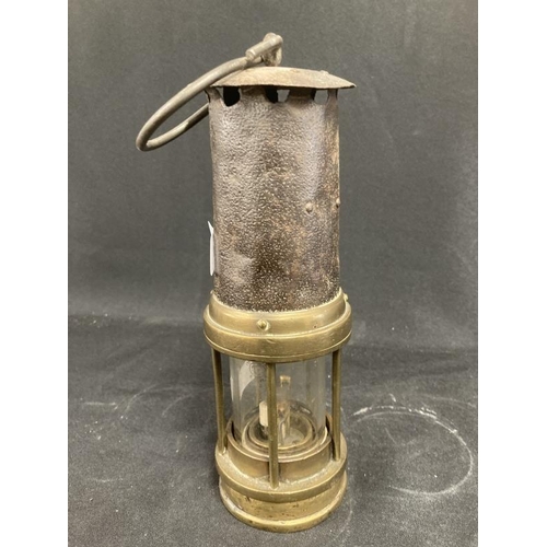 181 - Miners Safety Lamps: Late 19th cent. Unmarked example, stamped 18G on the reservoir. 10ins.