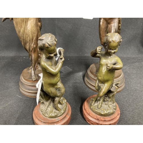 198 - Metalware: 19th cent. pair of French metal figures, lady with a fan and a gentleman blowing her a he... 