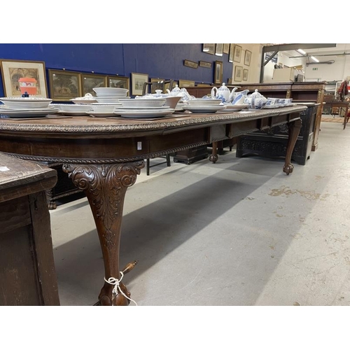 106 - 19th cent. Mahogany extending dining table with a Josheph Fitter winding mechanism, ornately carved ... 