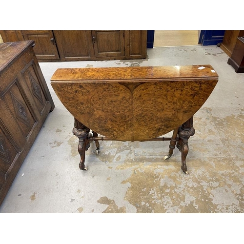 111 - 19th cent. Burr walnut Sutherland table on brass and ceramic castors. Approx. 41ins. x 36ins (when o... 