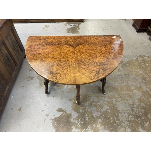 111 - 19th cent. Burr walnut Sutherland table on brass and ceramic castors. Approx. 41ins. x 36ins (when o... 