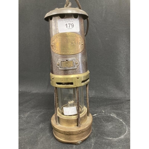 179 - Miners Safety Lamps: Early 20th cent. Evan Thomas & Williams, Aberdare No. B136, clock No. 655, cons... 