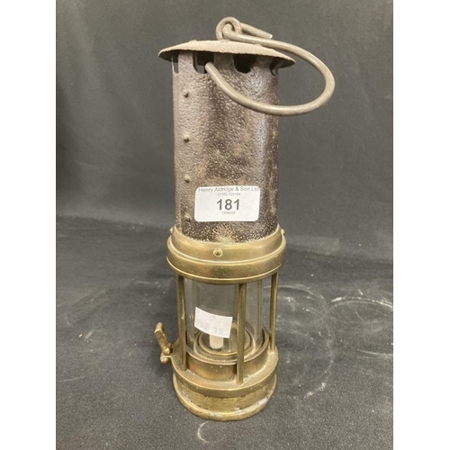 181 - Miners Safety Lamps: Late 19th cent. Unmarked example, stamped 18G on the reservoir. 10ins.