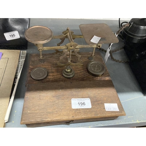 196 - Scientific Instruments: 20th cent. Brass postal scales and a hanging balance. (2)