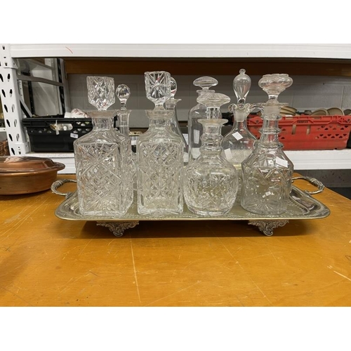 21 - Glass: Three ring glass decanters x 2, two square and four others plus a spare stopper and a diamond... 