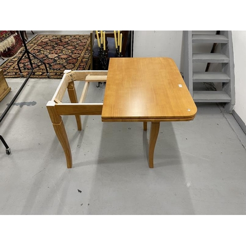 32 - 20th cent. Possibly Scandinavian, cherry or similar timber, dining table with a twist and flip top. ... 