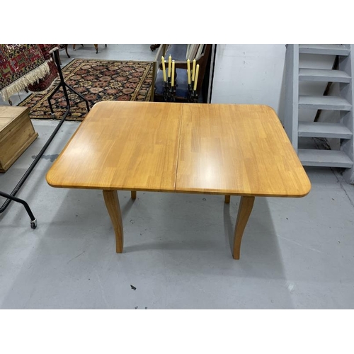 32 - 20th cent. Possibly Scandinavian, cherry or similar timber, dining table with a twist and flip top. ... 