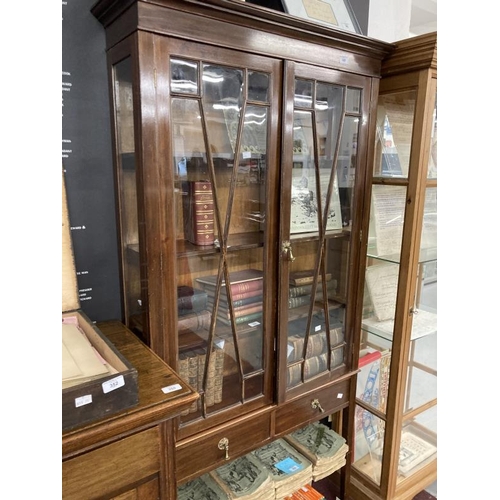 349 - Edwardian mahogany display cabinet with glazed doors above two drawers. 36ins. x 72ins. x 9½ins.