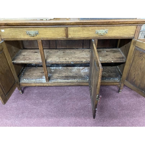 350 - 19th cent. Art style oak sideboard with two drawers above three doors. Approx. 60ins. x 20ins. x 39i... 