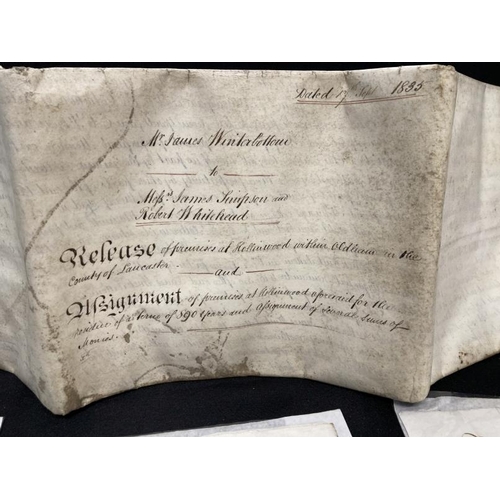 357 - Ephemera: Collection of four signed deeds dating from 1692 hailing from London, Surrey and Lancaster... 