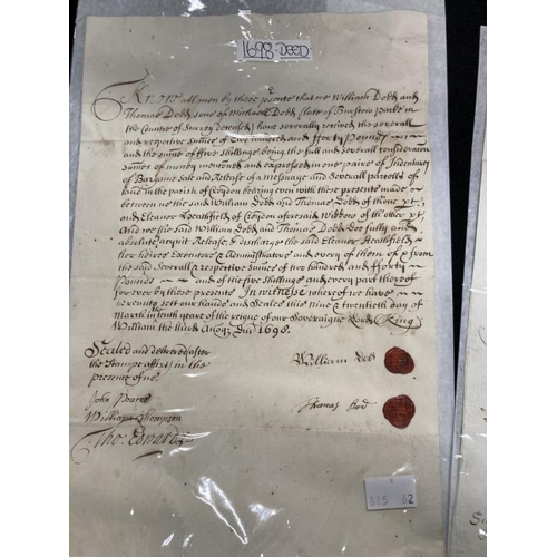 357 - Ephemera: Collection of four signed deeds dating from 1692 hailing from London, Surrey and Lancaster... 